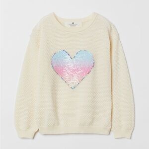 H&M Cream Sweater with Multicolor Sequin Heart 
And dark red top.